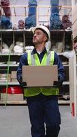 Warehouse Worker Carrying Box for Delivery Operations video