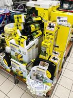 Kyiv, Ukraine - February 04, 2025 Variety of karcher products displayed on shelves in a store environment photo