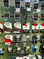 Kyiv, Ukraine - February 04, 2025 Display shelf showcasing computer memory and solid-state drives in a retail store photo