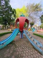 Playground Slide with Stone Steps Attached photo