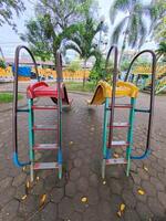 Colorful Playground Slides in a Park photo