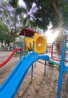 Colorful Playground Slides in a Lively Park photo