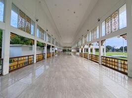 Great Hallway with Open Windows and Columns photo