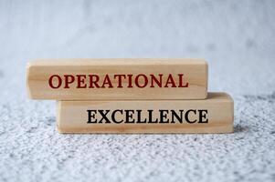 Operational Excellence text on wooden blocks. Operational excellence and effectiveness methodology photo