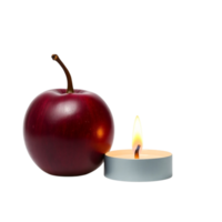 A red apple next to a candle isolated on transparent background png