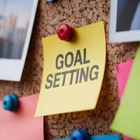 Sticky note with GOAL SETTING highlights focus and aspiration For Social Media Post Size photo