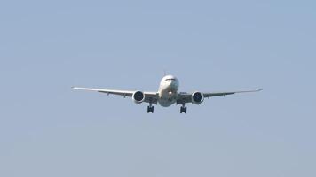 Cargo airplane approaching landing at Hong Kong. Airplane arriving. Jet flying overhead. Travel concept. Spotting video
