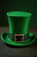 Green leprechaun hat sitting on dark wooden surface for saint patrick's day photo