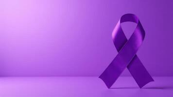 Purple ribbon standing on purple background symbolizing support for many causes photo