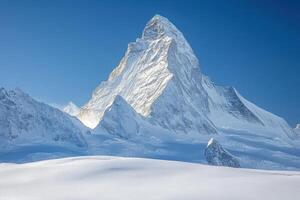 A large mountain with snow on top photo