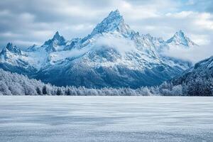 A snowy mountain range is seen in the distance photo
