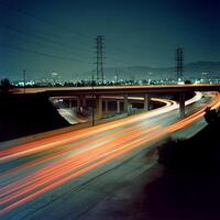 A highway with cars driving on it photo
