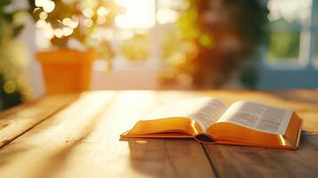 Open Bible book with golden pages resting on wooden table in warm sunlight, creating a peaceful and spiritual christian atmosphere, 4K photo