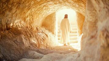Happy Easter Jesus Christ is walking out of his tomb after the resurrection, in bright sunlight photo