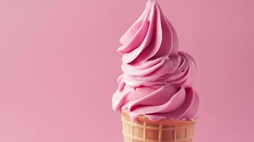 A Pink ice cream cone on a blank pink background, summery setting with copy space. photo