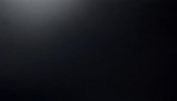 A black square with a light shining through it photo