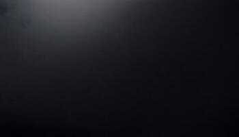 A black background with a light shining through it photo