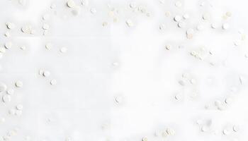 White confetti falling on a white background photo