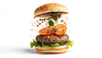 A hamburger with toppings flying out of it photo