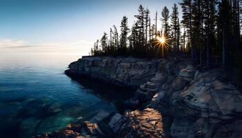 A rocky cliff with trees and water photo