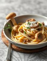 Spaghetti with mushrooms and parmesan cheese photo