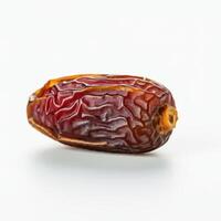 Fresh whole dates fruit elegantly placed on white background for minimalist food styling photo