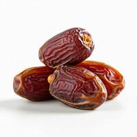Delicious fresh whole dates fruit captured on white background for appetizing visuals photo
