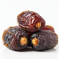 Inviting fresh whole dates fruit arranged on white background for cozy home cooking themes photo