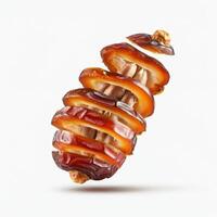 Delightful fresh slice of dates fruit captured on white background for festive table settings photo