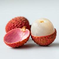 Fresh lychee slice with vibrant colors on white background, ready for healthy recipes photo