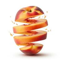 Slices of fresh peach with a leaf, arranged on a white surface. photo