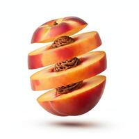 Freshly cut peach slices accompanied by a leaf, placed on a white surface. photo