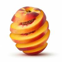 A white background displaying slices of fresh peach with a leaf. photo