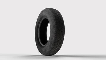 old tire on white backdrop, bottom view photo