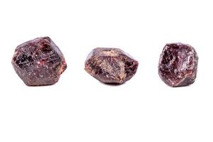 close up of a mineral garnet stone on a white background photo