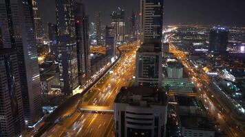 Night View of Vibrant Cityscape with Illuminated HighRises and Networks of Roads video
