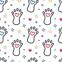 a pattern with paw prints and hearts vector