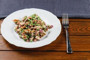 Fresh green pea salad with scallions and purple onion. on whole grain bread photo