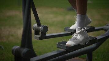 Outdoor Exercise Equipment Stepper in Use, promoting health and fitness in nature while exercising video