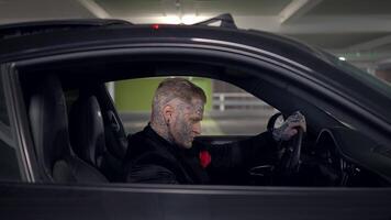 A Mysterious Figure Inside a Car Displaying Intriguing and Bold Tattoos Caught My Attention video