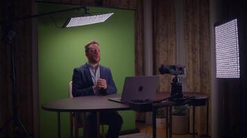 A media production setting with a green screen for creative projects and broadcasts video