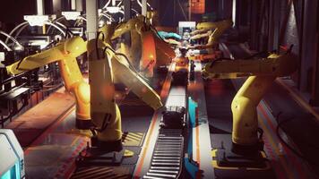 Automated conveyor belt system operating with robotic arms in a factory video