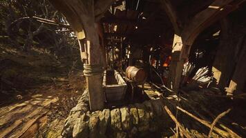 Rustic workshop with wooden barrel and tools in a forest setting video