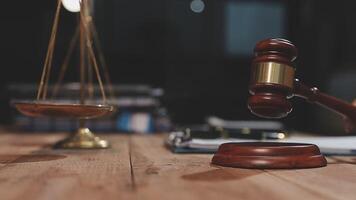 A judge's gavel on a wooden table video