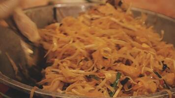 A bowl of noodles with a fork in it video