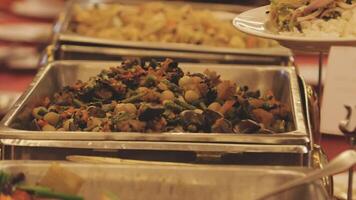 A buffet table with many different types of food video