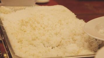 A tray of rice sitting on a table video