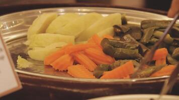 A plate with vegetables and a fork video