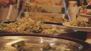 A buffet table with many different types of food video