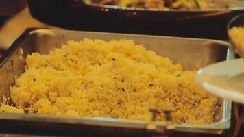 A tray of rice with a fork in the middle video